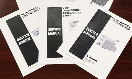 An assortment of user manuals for printers